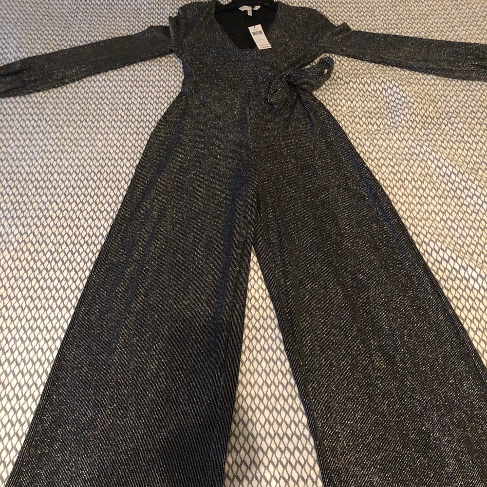 BCBGeneration silver metalic Long sleeve Jumpsuit.